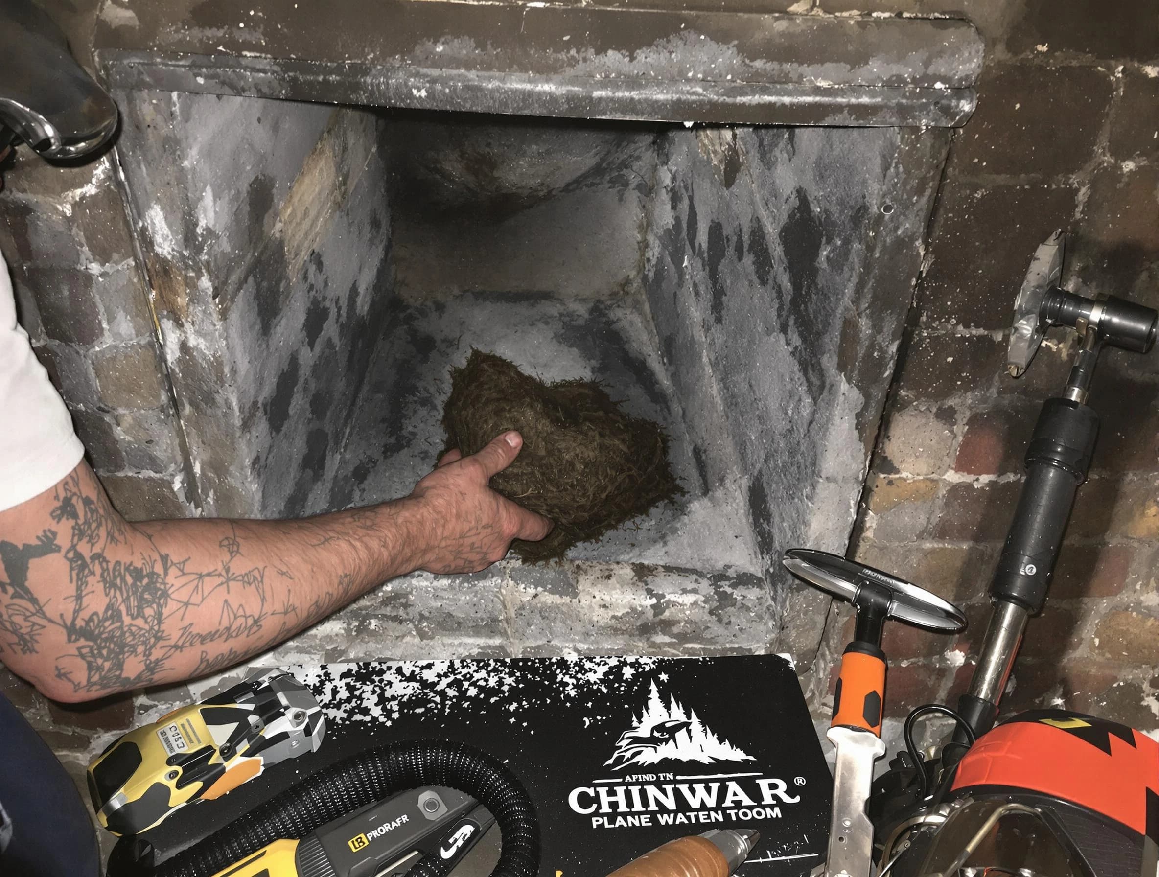 Oklahoma City Chimney Sweep safely removing debris and screening chimney in Oklahoma City, OK