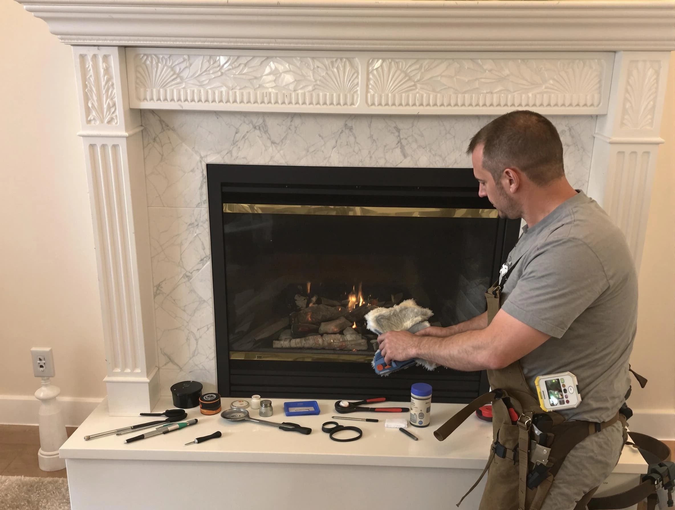 Oklahoma City Chimney Sweep performing fireplace maintenance in Oklahoma City, OK